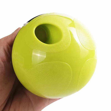 Interactive tumbler slow feeder toy for dogs and cats with pink and green options