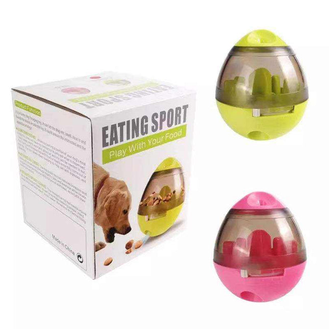Interactive tumbler slow feeder toy for dogs and cats in pink and green